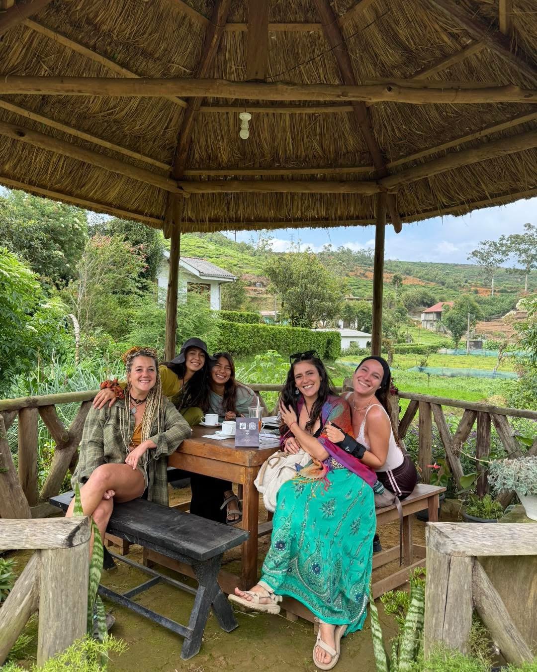Guests in the gazebo looking out over the hills