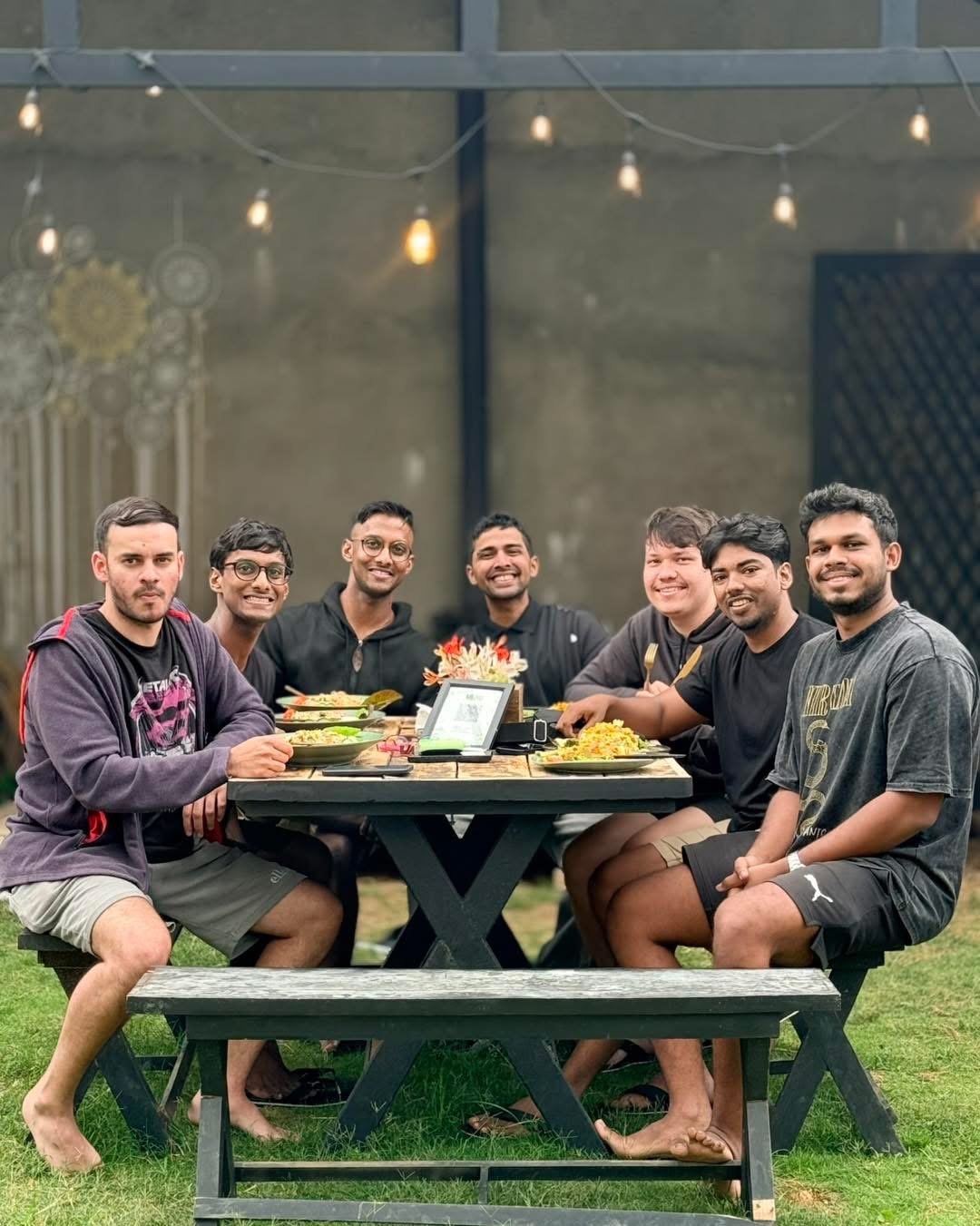 A group of friends over lunch in the garden